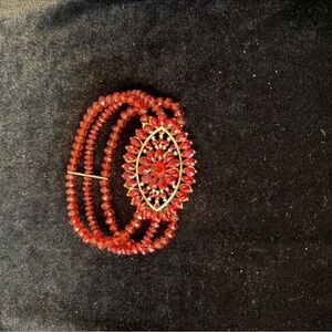 Elegant Red Beaded Bracelet with Floral Accent